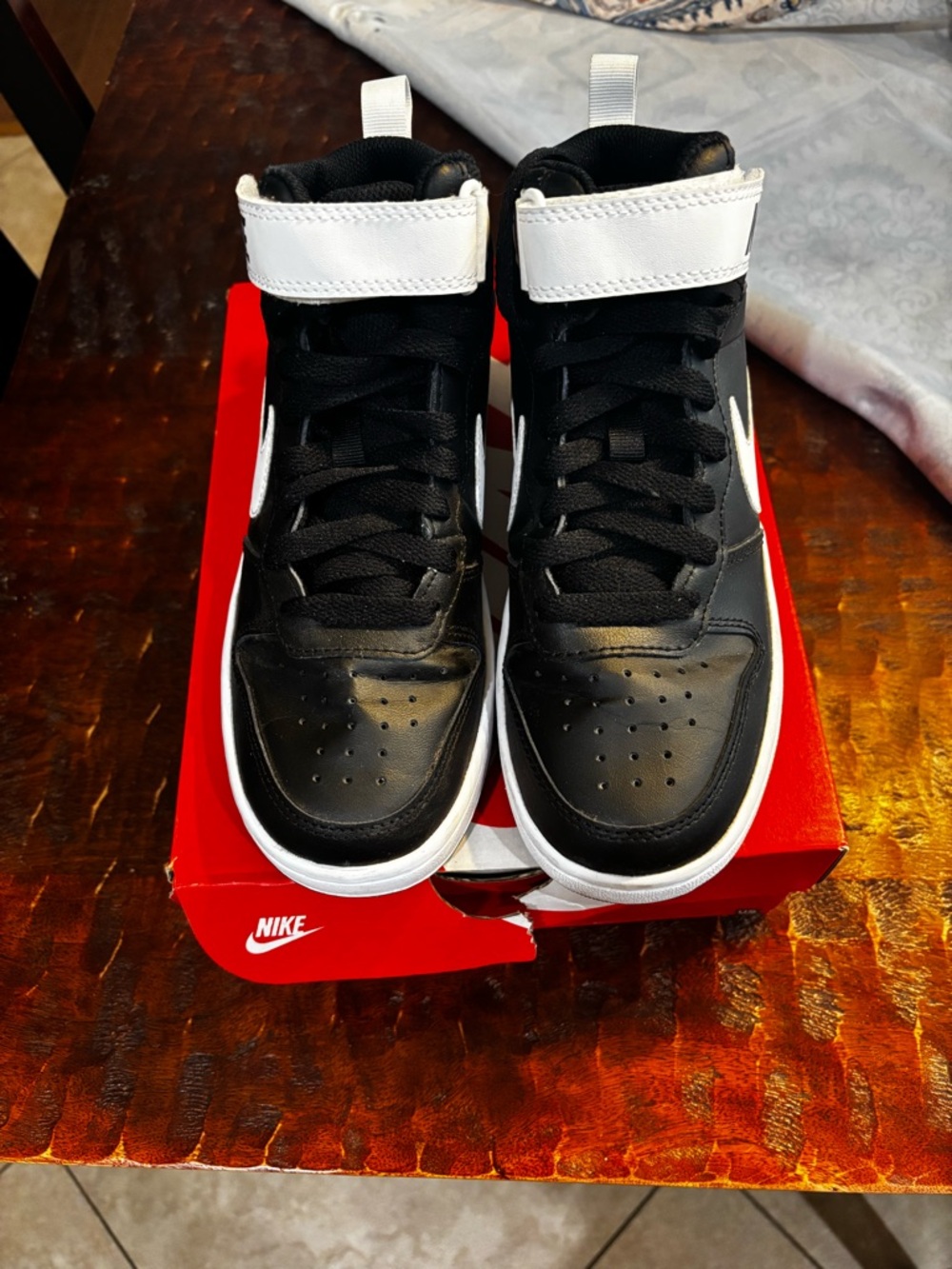 Nike Black and White Mid-Top Sneakers with Contrast Strap